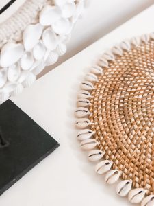 aris rattan placemat with cowrie shells