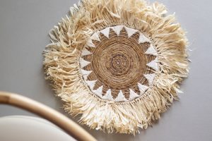 Raffia and banana leaf placemat with macramé