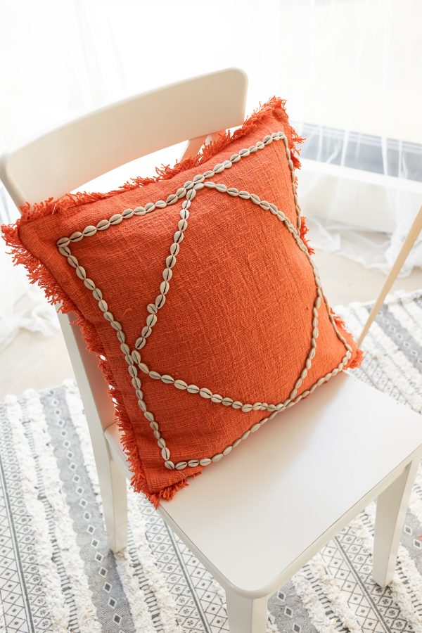 Soft cotton cushion cover with cowrie shells and fringe